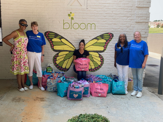 FDW Donates 3150 NEW pairs of socks and underwear to Bloom Closet